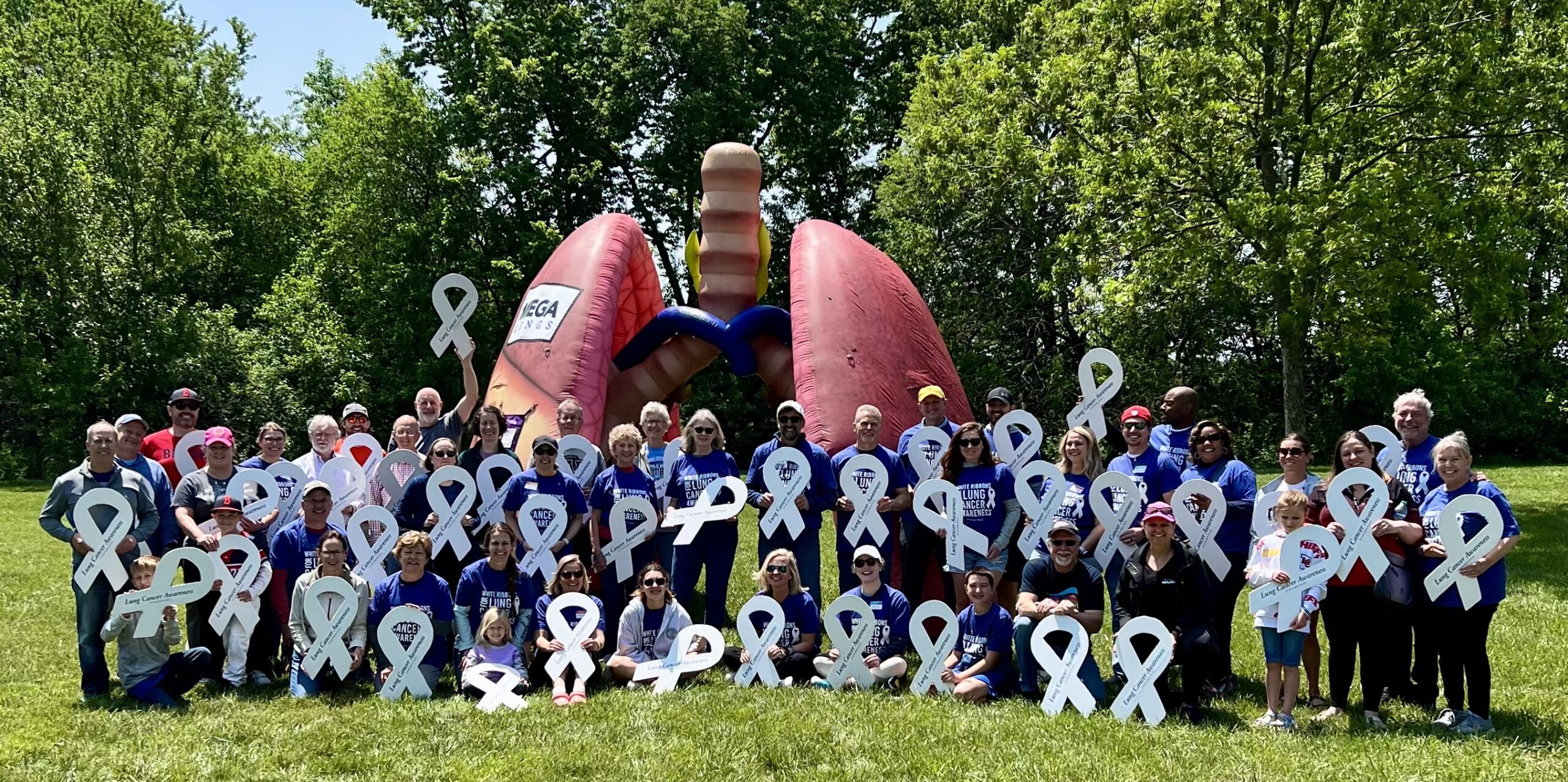 Kansas City gathering builds 100 white ribbons